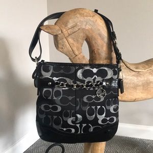 Coach No. G1276-F19820 black and silver.